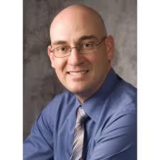 Dr. Curtis L. Frewin, MD