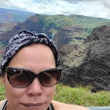 How long does Kauai beach water stay brown after a storm?