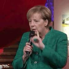 Morpheus0 back with the daily corona fearmongering thread if you want that someone takes you serious you should start with using a legit. Merkel Holding Things