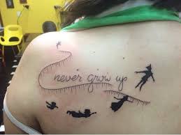 27 Minimalist Peter Pan Tattoos To Remind You To Never Grow Up Peter Pan Tattoo Tattoos Peter Pan