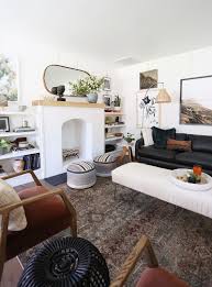 The taupe color on the walls preferred to white paint for the decoration of a contemporary living room to create a subdued atmosphere around a brightly colored sofa. Evergreen House Living Room Reveal Juniper Home