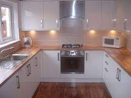 Modern supermatt light & dust grey kitchen with 20mm solid quartz grey worktops. White Kitchen Oak Worktop Grey Floor Instaimage