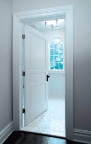 This is a white two panel door with black lever hardware. Premium Doors Interior Doors And Closets Doors Interior Traditional Interior Doors White Internal Doors
