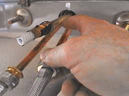 Turn off the valves under the sink by rotating the valve handles counterclockwise. How To Remove And Replace A Kitchen Faucet How Tos Diy