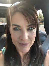 Rose color, wear it with or without crossbody strap, soft leather.