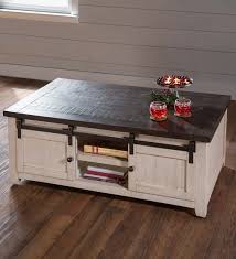 Our cape charles coffee/cocktail table is expertly crafted of reclaimed pine in a vintage white finish with a contrasting barn wood top. Cape Charles Reclaimed Wood Coffee Cocktail Table With Sliding Barn Doors White Plowhearth