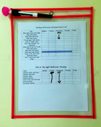 cleaning checklists hanging in our classrooms bathrooms