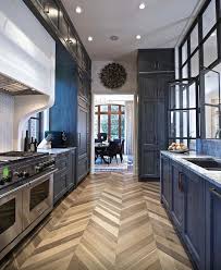 Dark Lowers With White Uppers And Hair And Bone Flooring Love This Look Kitchen Flooring Best Flooring For Kitchen Cork Flooring