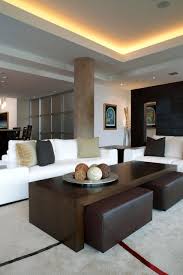 Coffee table with ottomans underneath. Ottoman Under Coffee Table Houzz