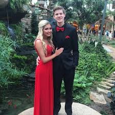 Senior Prom Red Two Piece Lace Dress With Matching Black And Red Tux Lamar Prom 2015 Insta Lynseyhencke Prom Couples Red Prom Suit Prom Tuxedo