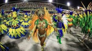 Cele mai frumoase femei de la şcoli de samba renumite au dansat pe străzile metropolei aproape goale. Brazilia Devine Capitala InternaÅ£ionalÄƒ A DistracÅ£iei Incepe Carnavalul De La Rio Foto B1 Ro
