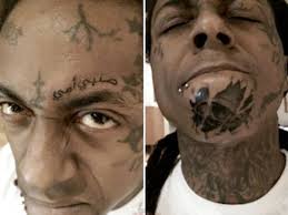 Banks some pics of their otf tattoos. Lil Wayne Gets Two New Face Tattoos Tattoo Ideas Artists And Models