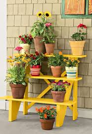 To make this plant stand, you will need four concrete blocks, two boards, and a tray. Pin On Flowers