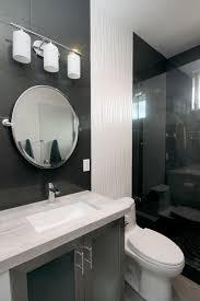 Consider using grey tile on the floor, the walls, in the shower, or even as the counter surface. Gray Bathroom Design Ideas
