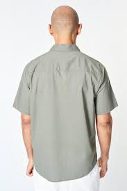 Download Download Premium Image Of Man In A Gray Shirt Mockup Rear View 2465064 Grey Shirt Shirt Mockup Clothing Mockup