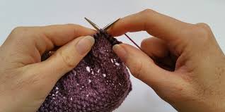 Hold the yarn and bring the hands together to make a loop. How Do You Hold Your Knitting