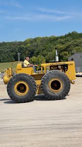 Image result for Caterpillar New Yellow 1995 Fleet