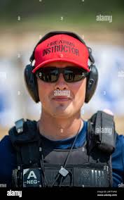 Coast Guard Petty Officer Second Class Tyler Vance mediates the range as a  Firearms Arms Instructor May 12th, 2022, in Kiln, Mississippi. Maritime  Safety and Security Team New Orleans maintains weapon proficiency