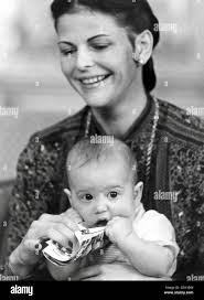 Queen Silvia with Prince Carl Philip Stock Photo