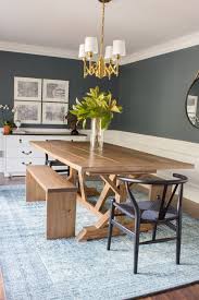 Contemporary setup for a modern dining room with a minimalistic, rectangular shaped dining table made out of walnut wood with rounded edges. Modern Farmhouse Dining Table Benches Erin Spain