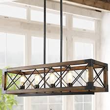 Although it may seem obvious to hand a chandelier in a dining room, these multipurpose fixtures look great in a variety of interiors. Buy Farmhouse Chandelier For Dining Room 5 Light Rectangular Chandelier Wood Kitchen Island Lighting 31 5 L Online In Indonesia B07x2rg9rm