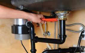 Black finish blends elegantly into garbage disposal and kitchen sink drain opening. 6 Signs You Need A Plumber To Fix Your Garbage Disposal