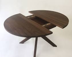 Round Dining Table Solid Walnut With Modern Sculptural Solid Etsy Round Dining Table Round Dining Table Modern Modern Dining Table