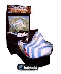 Featuring two steering control levers, you'll need lighting fast reflexes to steer your podracer as you zip along one of the four detailed tracks. Star Wars Racer Arcade Deluxe Primetime Amusements