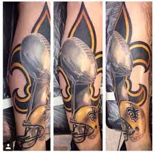 The tattoo features the super bowl lv logo and the lombardi trophy. Designs New Orleans Saints Tattoo Elegant Arts Tattoo