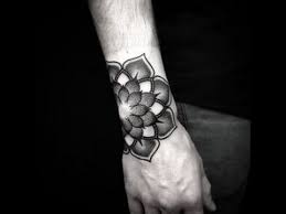 Twisted fern whispy and delicate fern leaf wraps around the wrist in black for a simple elegant tattoo. Wrap Around Wrist Tattoos Youtube