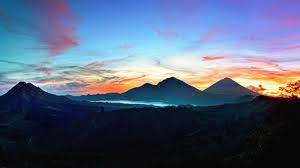 Download Wallpaper 1366x768 Mountains Sky Bali Sunrise Kintamani Indonesia Laptop 1366x768 Hd Back Nature Wallpaper Macbook Wallpaper Beautiful Wallpapers