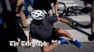 Watch: Joe Biden falls off bike while cycling in Delaware