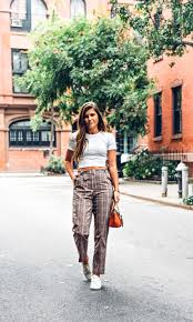 Black And White Checkered Pants Outfit Ideas Plaid Trouser Pants Outfit White Crop Top Orange Bag White Sneakers Outfit Fall Outfit Ideas Bright Fall Outfits White Sneakers Outfit Plaid Pants Outfit