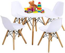 Table and chair sets not only provide a stylish, coordinated accent to your kid's living space, but they're often a more affordable alternative to buying. Amazon Com Costzon Kids Table And Chair Set Kids Mid Century Modern Style Table Set For Toddler Children Kids Dining Table And Chair Set 5 Piece Set White Table 4 Chairs Furniture Decor