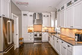 Oak kitchen cabinets are also excellent for creating eclectic designs. White Grey Shaker Kitchen Cabinets White Oak Flooring Kitchen Remodel Powell Ohio