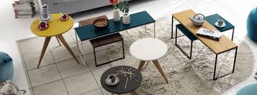 The lacquered designer side tables are also available in bold colours. Furniture Innoshop