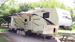 The garage space can be used to carry motorcycles, atvs and toy haulers are excellent options for weekend snowmobiling trips or taking personal watercraft to the lake. 2007 Forest River Wildwood 356 Srv Toy Hauler Fifth Wheel Youtube