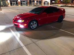 Image result for Light Driftwood 2004 Pontiac