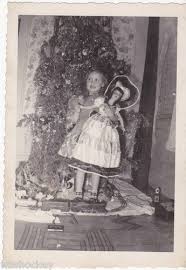 A Little Girl With Her 1950s Boudoir Doll Christmas Pictures Vintage Vintage Christmas Photos Vintage Christmas