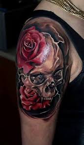 The most famous design depicts a rose growing out of a skull's eye sockets. 100 Awesome Skull Tattoo Designs Cuded Skull Rose Tattoos Skull Tattoo Design Skull Sleeve Tattoos
