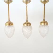 The glass will transmit around 80 percent of the available. Set Of 3 Art Nouveau Solid Brass Satinated Glass Ceiling Lights 1940s 170938