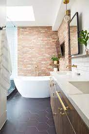 This tiny bathroom is made to feel much larger by the inclusion of mirror all around the room. 48 Stylish Bathrooms With Brick Walls And Ceilings Digsdigs