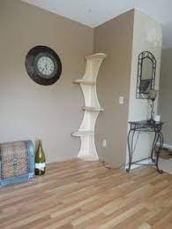 Tall cabinets provide needed storage in tiny spaces. Cat Crap I Love