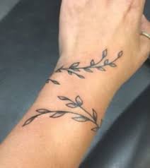 Circling vines can strangle your tree wisteria is one of many circling vines that tightly wrap themselves around tree trunks. Vine Tattoo Design Meanings And Different Variations