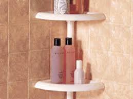 The bathroom starts to take shape with the easy installation of a sterling shower stall and new tile floor. Organizing Your Shower Hgtv