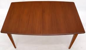 Check spelling or type a new query. Danish Mid Century Modern Teak Dining Table With Two Pop Up Self Storing Leaves For Sale At 1stdibs