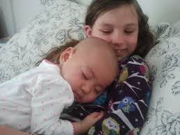 We just had this love for her': Family adopts Chinese baby with cancer