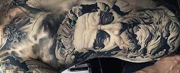 This amazing marigold tattoo design is made on the arm of the wearer. 50 Unbelievable Tattoos For Men Inconceivable Ink Design Ideas