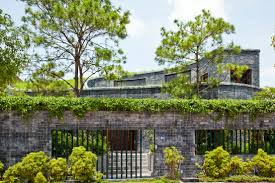 Green roofs also serve an aesthetic purpose, helping to soften the look of rooftops and blend buildings into the natural environment. Spiraling Green Roof House In Vietnam Designs Ideas On Dornob