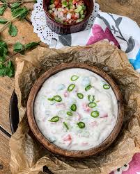 Well whisked yogurt is jeera is very important in indian cuisine. Tomato Onion Cucumber Raita Recipe By Archana S Kitchen